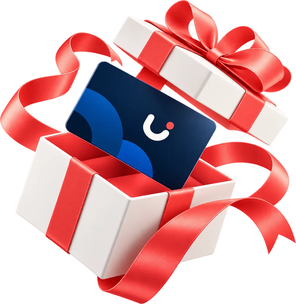 Une boîte cadeau ouverte et une carte UniCado